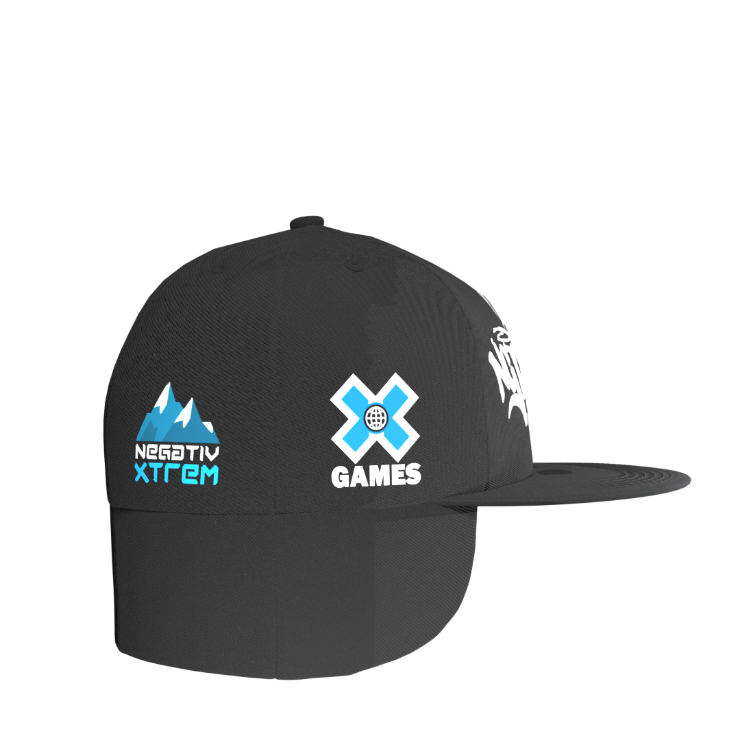 Side view of Negativ Down Flap Cap – embroidered NGTV World graffiti logo with winter-ready fur details.